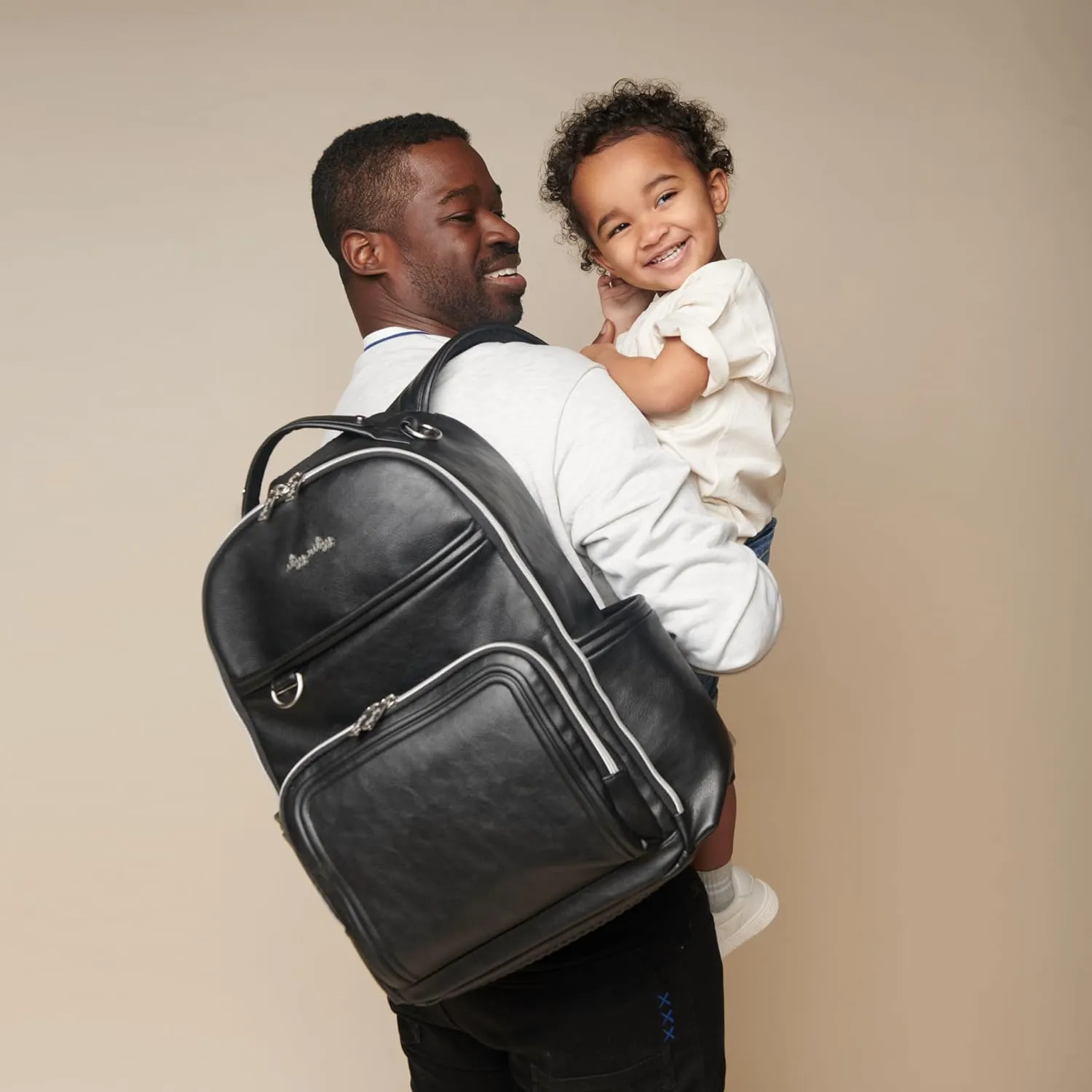 Itzy Ritzy Diaper Bag Backpack  Large Capacity Boss Plus Baby Backpack Diaper Bag Featuring 19 Pockets, Changing Pad, Stroller Clips, and Comfortable Backpack Straps, Black with Silver Hardware