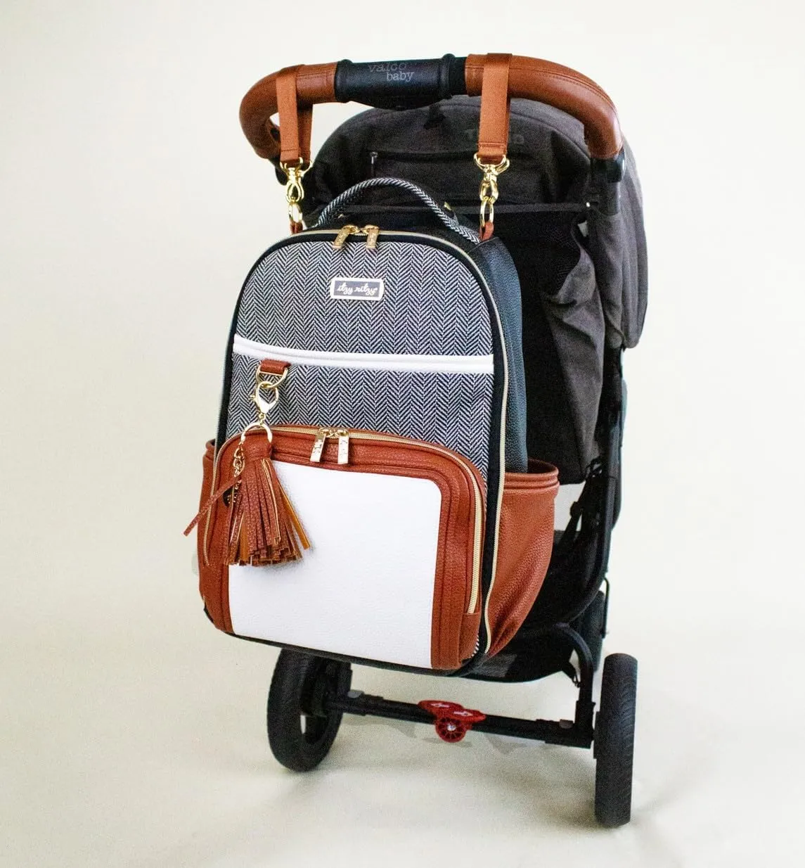 Itzy Ritzy Diaper Bag Backpack  Large Capacity Boss Plus Baby Backpack Diaper Bag Featuring 19 Pockets, Changing Pad, Stroller Clips, and Comfortable Backpack Straps, Coffee & Cream Boss Plus